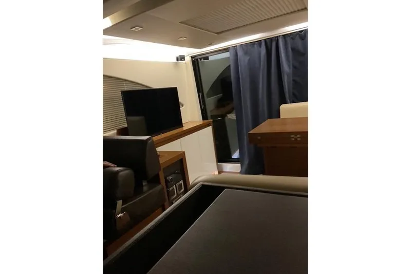 Slide: The Image of Luxurious interior of 2014 Beneteau Gran Turismo 49 yacht with modern furnishings. - 12