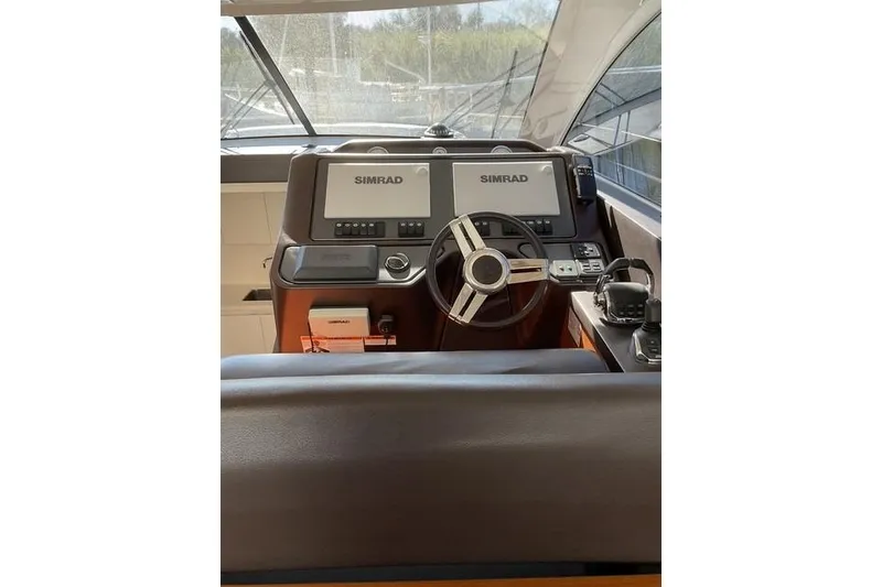 Slide: The Image of Helm of 2014 Beneteau Gran Turismo 49 with Simrad navigation system. - 14