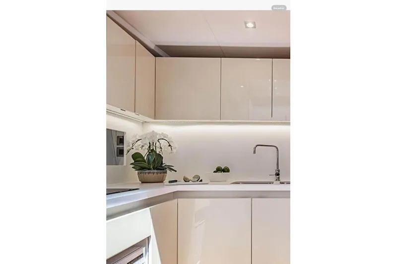 Slide: The Image of Modern kitchen interior of 2014 Beneteau Gran Turismo 49 yacht with sleek cabinetry and decor. - 15