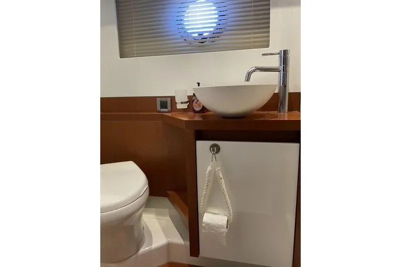 Slide: The Image of Bathroom interior of 2014 Beneteau Gran Turismo 49 yacht with modern sink and toilet. - 20