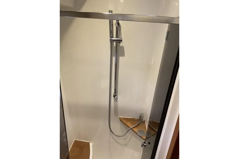 Slide: The Image of Shower area in 2014 Beneteau Gran Turismo 49 yacht, featuring modern fixtures. - 21