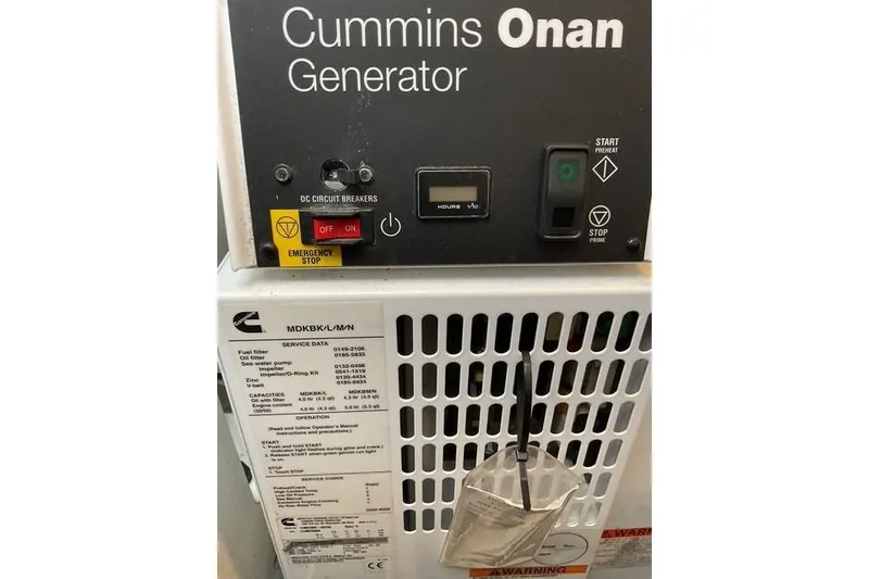 Slide: The Image of Cummins Onan generator control panel on 2014 Beneteau Gran Turismo 49 yacht. - 30