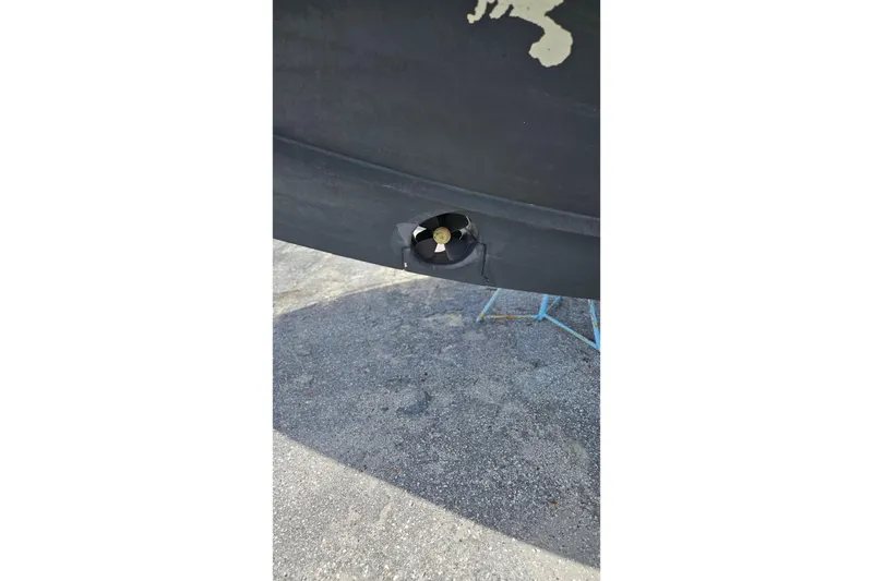 Slide: The Image of Close-up of a 2014 Beneteau Gran Turismo 49 boat's hull and propeller. - 32