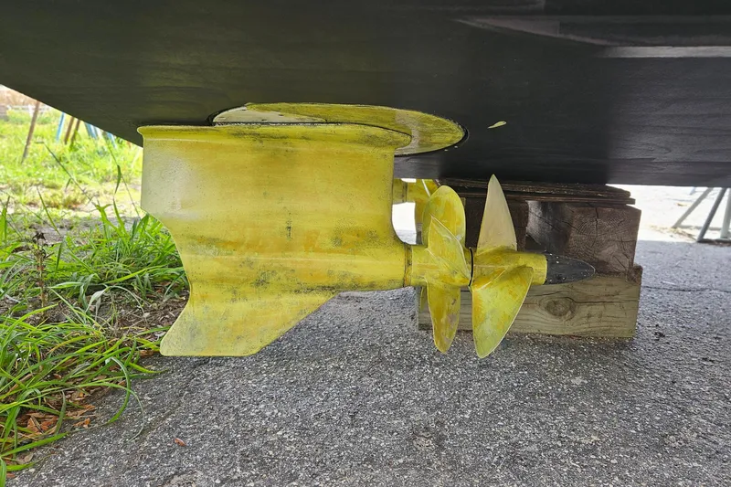 Slide: The Image of Close-up of a 2014 Beneteau Gran Turismo 49 boat propeller on a stand. - 37