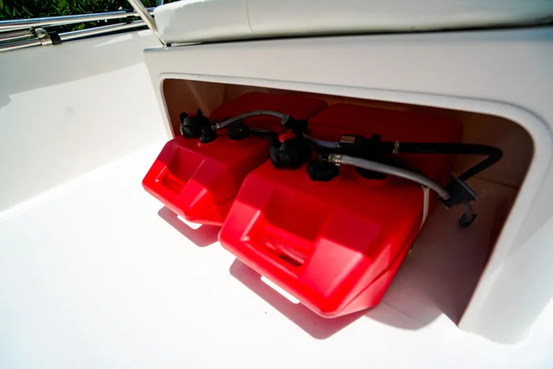 Slide: The Image of Red fuel tanks on a 2016 Boston Whaler 170 Montauk boat. - 7