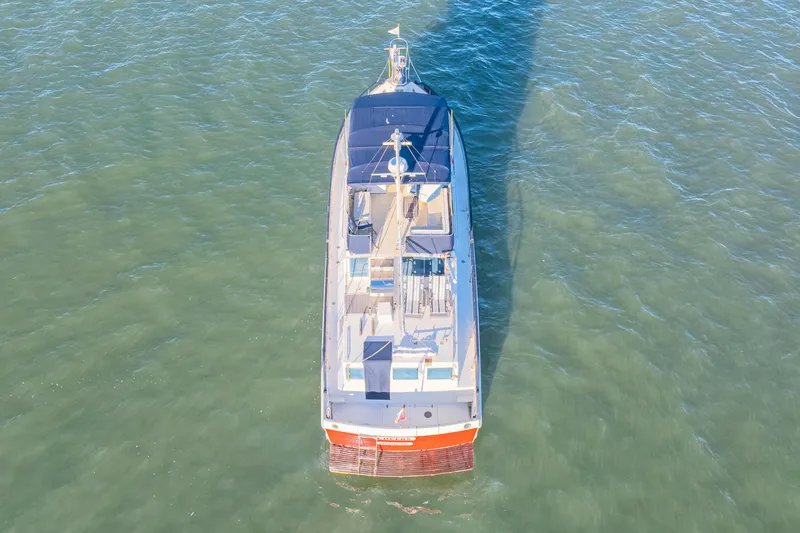 Slide: The Image of Aerial view of 1989 Grand Banks 46 Classic yacht on open water. - 10
