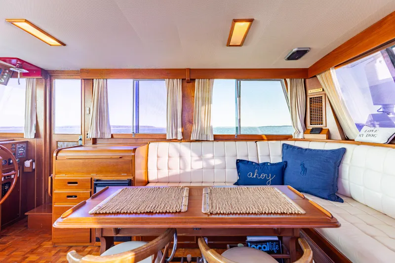 Slide: The Image of Interior of 1989 Grand Banks 46 Classic yacht with wooden furnishings and nautical decor. - 19