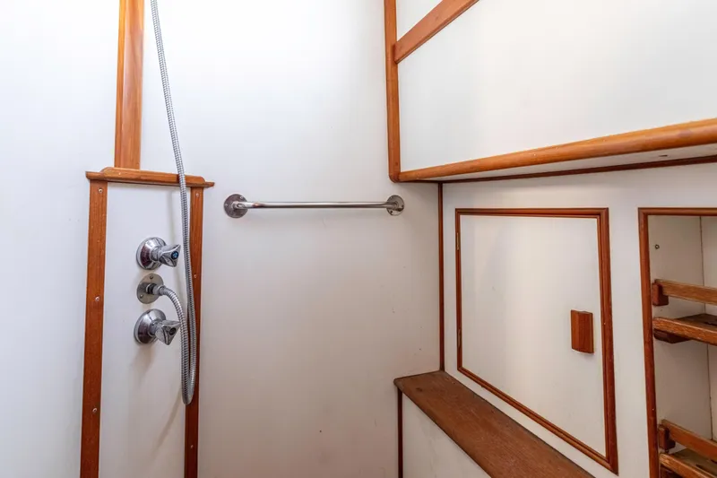 Slide: The Image of Shower area in 1989 Grand Banks 46 Classic yacht with wood accents. - 32