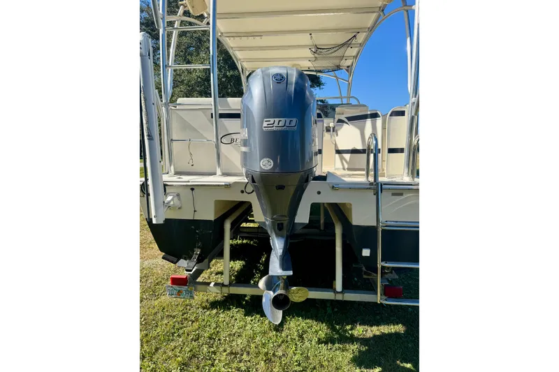 Slide: The Image of 2017 Beachcat 230 boat with Yamaha 200 outboard motor, rear view. - 16
