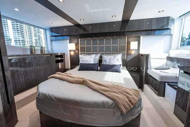 Slide: The Image of Luxurious bedroom interior of 2021 Galeon 500 Fly yacht with modern design elements. - 2