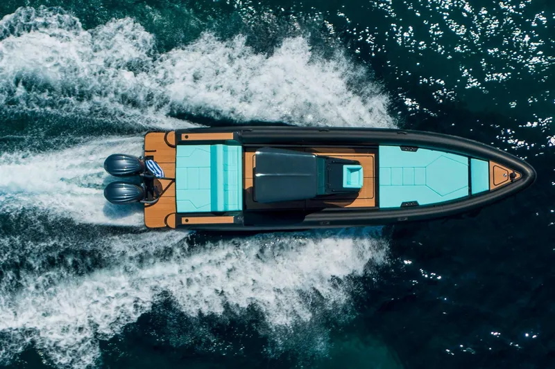 Slide: The Image of Aerial view of 2026 Rock Marine RM 36 speedboat cruising on open water. - 7