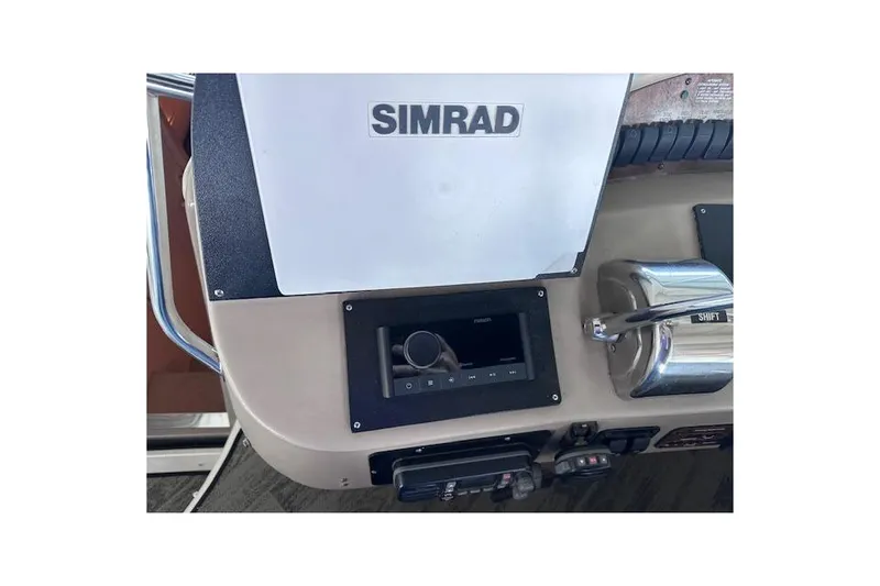 Slide: The Image of Control panel of 2001 Sea Ray 340 Sundancer with Simrad navigation system. - 13