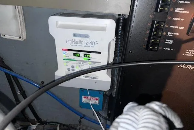 Slide: The Image of ProNautic 12-40P marine battery charger in 2001 Sea Ray 340 Sundancer engine room. - 36