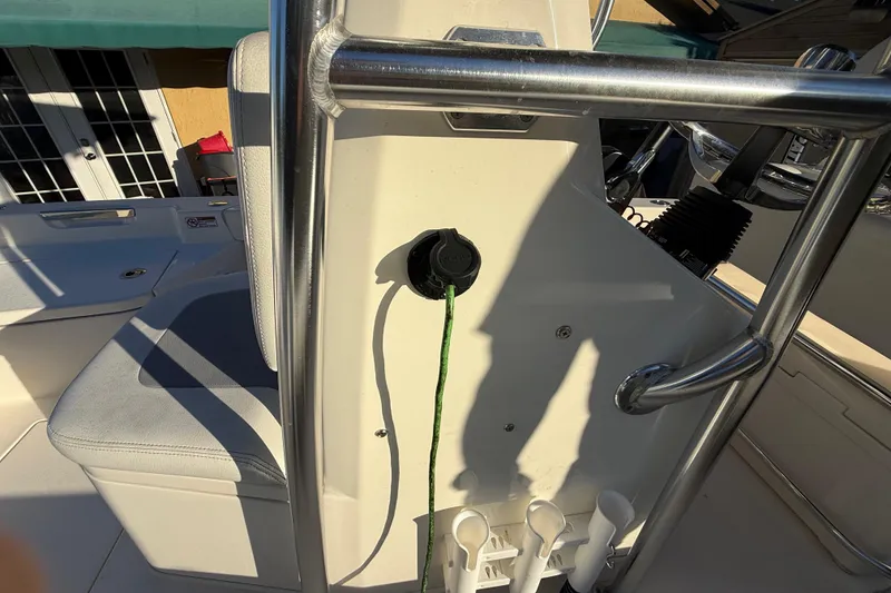 Slide: The Image of 2005 Pathfinder TRS boat interior with seating and railing, photographed in 2022. - 106