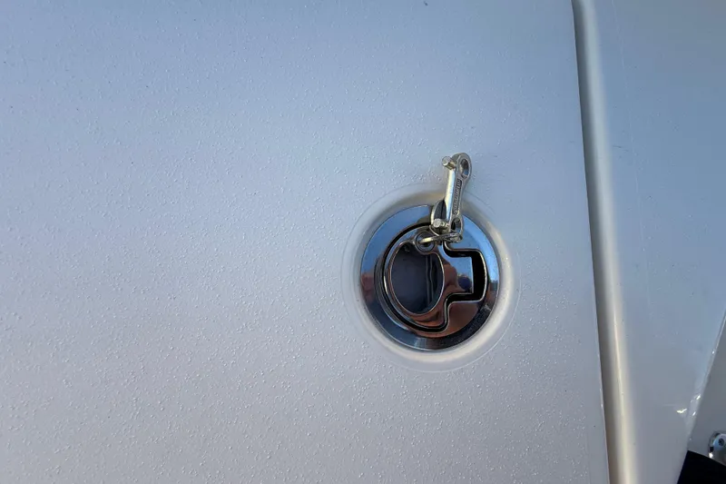 Slide: The Image of Close-up of a 2022 Pathfinder 2005 TRS boat cleat on a white surface. - 107