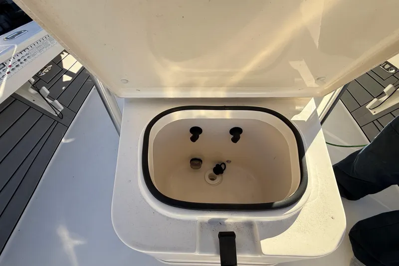 Slide: The Image of Open storage compartment on 2022 Pathfinder 2005 TRS boat deck. - 113