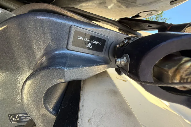 Slide: The Image of Close-up of a 2022 Pathfinder 2005 TRS engine component with CAN ICES-2/NMB-2 label. - 24