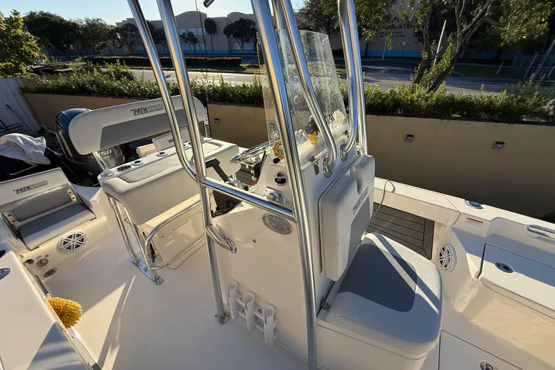 Slide: The Image of 2005 Pathfinder TRS boat interior with seating and console, photographed in 2022. - 38