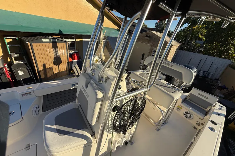 Slide: The Image of 2005 Pathfinder TRS boat interior with seating and equipment, photographed in 2022. - 39