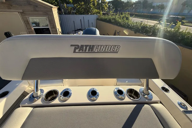 Slide: The Image of Pathfinder 2005 TRS boat seat with rod holders, 2022 model, in sunlight. - 53