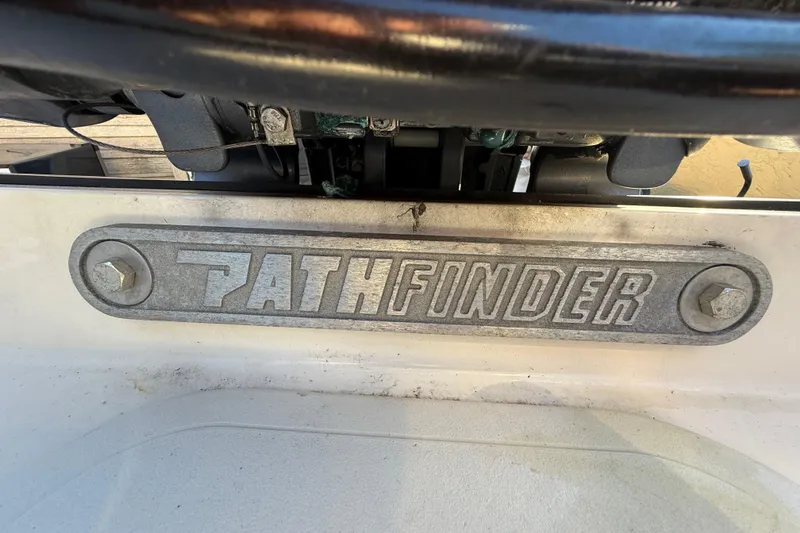 Slide: The Image of Pathfinder 2005 TRS emblem on a 2022 model, showcasing brand logo and design. - 66