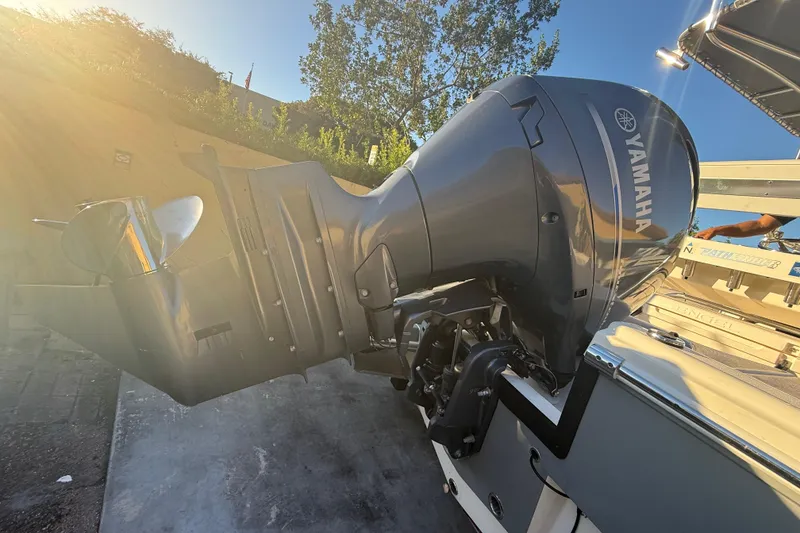 Slide: The Image of Yamaha outboard motor on 2022 Pathfinder 2005 TRS boat, sunlit background. - 70