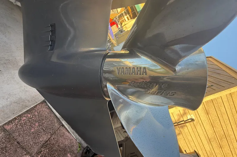 Slide: The Image of Yamaha Reliance Series propeller on 2022 Pathfinder 2005 TRS boat, close-up view. - 72