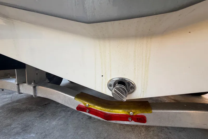 Slide: The Image of Close-up of a 2022 Pathfinder 2005 TRS boat drain plug and trailer. - 80