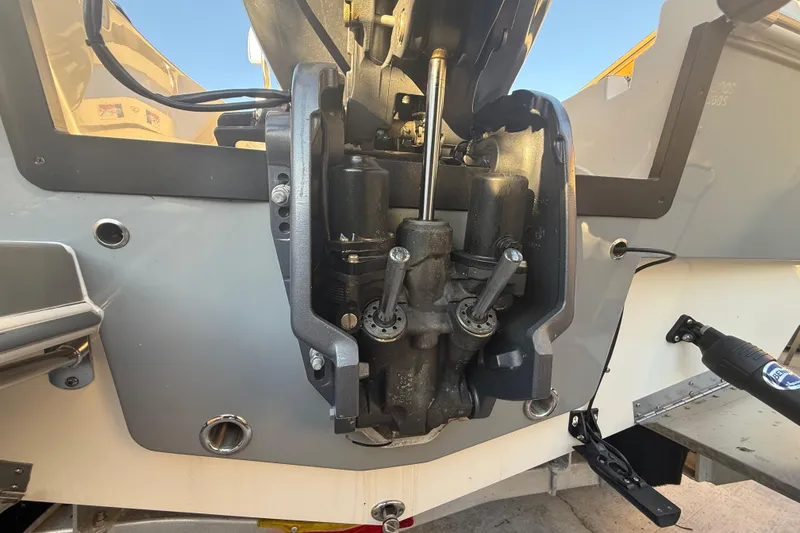 Slide: The Image of Close-up of a 2022 Pathfinder 2005 TRS boat engine component. - 81