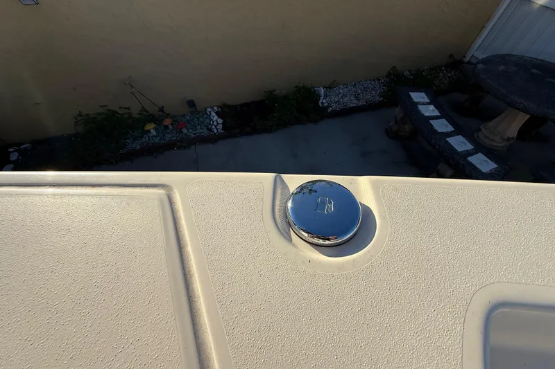 Slide: The Image of Boat deck with chrome fuel cap, Pathfinder 2005 TRS model, 2022. - 85