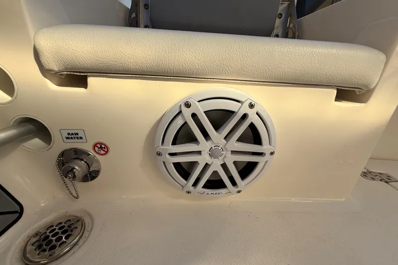 Slide: The Image of Boat interior with JL Audio speaker and raw water access, Pathfinder 2005 TRS, 2022 model. - 92