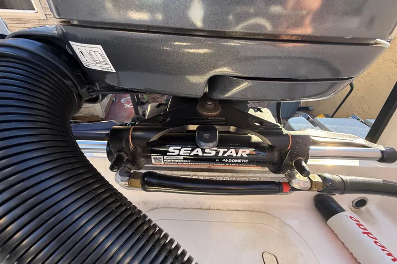 Slide: The Image of Hydraulic steering system on a 2022 Pathfinder 2005 TRS boat, featuring SeaStar by Dometic. - 97