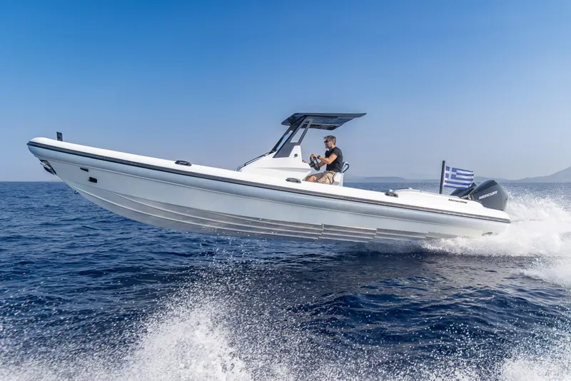The Image of 2026 Rock Marine RM 30 boat cruising on open sea with Greek flag. - 0
