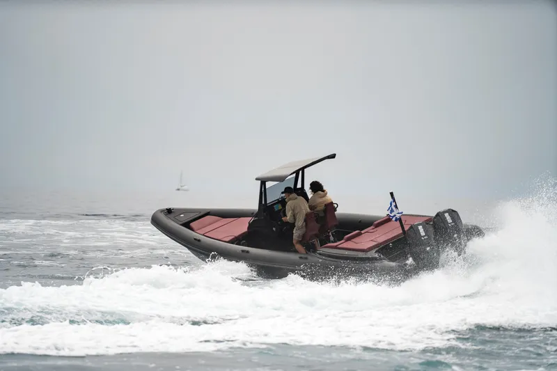 Slide: The Image of 2026 Rock Marine RM 30 boat navigating waves, featuring dual engines and a Greek flag. - 9