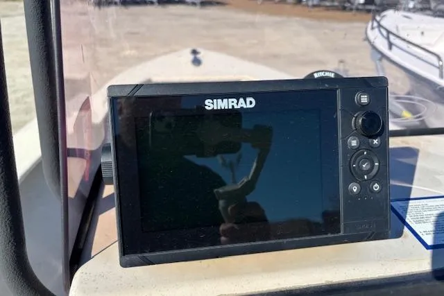 Slide: The Image of Simrad navigation system on 2022 May-Craft 1800 Center Console boat dashboard. - 16