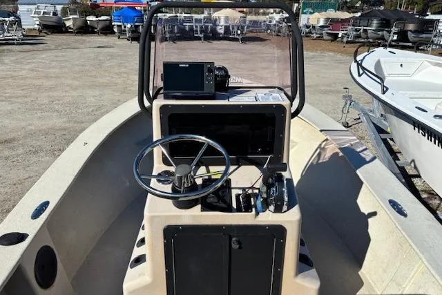 Slide: The Image of 2022 May-Craft 1800 Center Console boat with steering wheel and navigation equipment. - 18