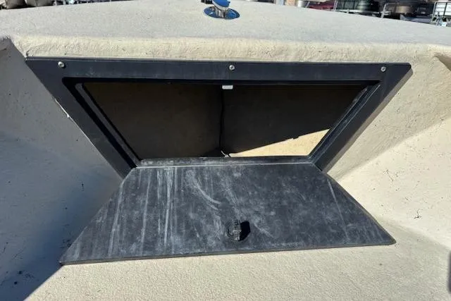 Slide: The Image of 2022 May-Craft 1800 Center Console boat storage compartment, open and empty. - 23