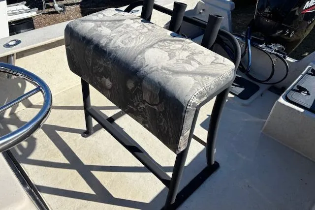 Slide: The Image of 2022 May-Craft 1800 Center Console boat with cushioned seat and rod holders. - 9