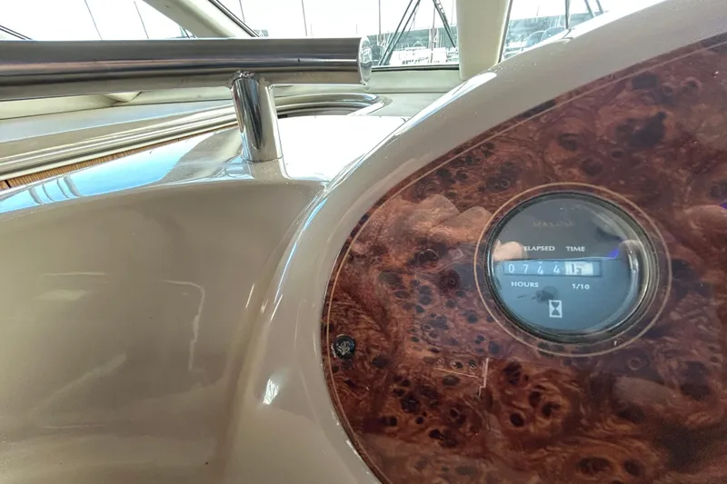 Slide: The Image of 1999 Maxum 4600 SCB yacht interior hallway with wooden door and cozy cabin view. - 19