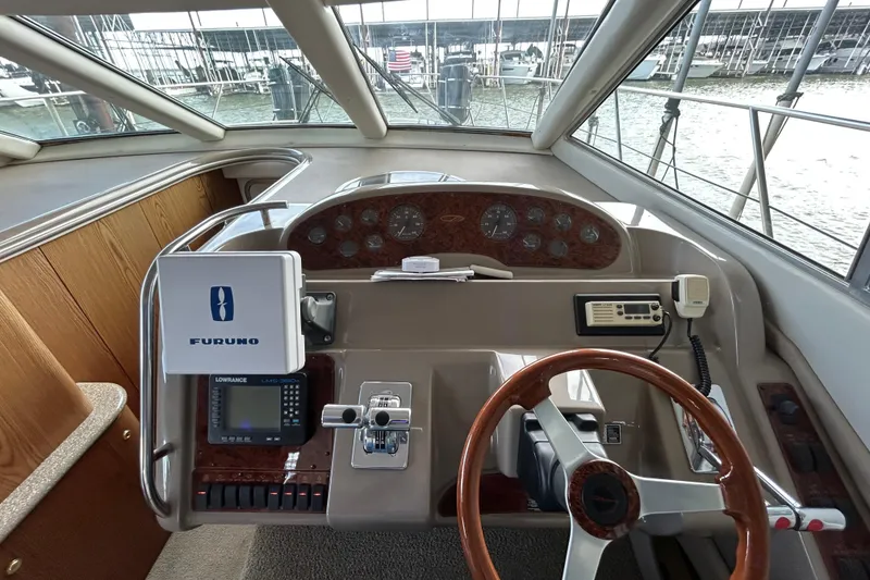 Slide: The Image of 1999 Maxum 4600 SCB yacht kitchen with modern appliances and sleek countertops. - 21