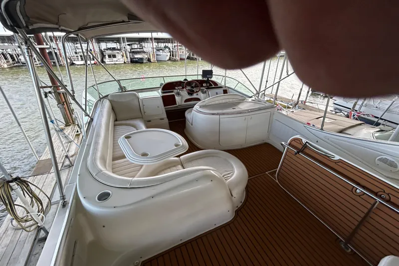 Slide: The Image of 1999 Maxum 4600 SCB yacht with teak deck, docked in Highland Village, TX. - 39