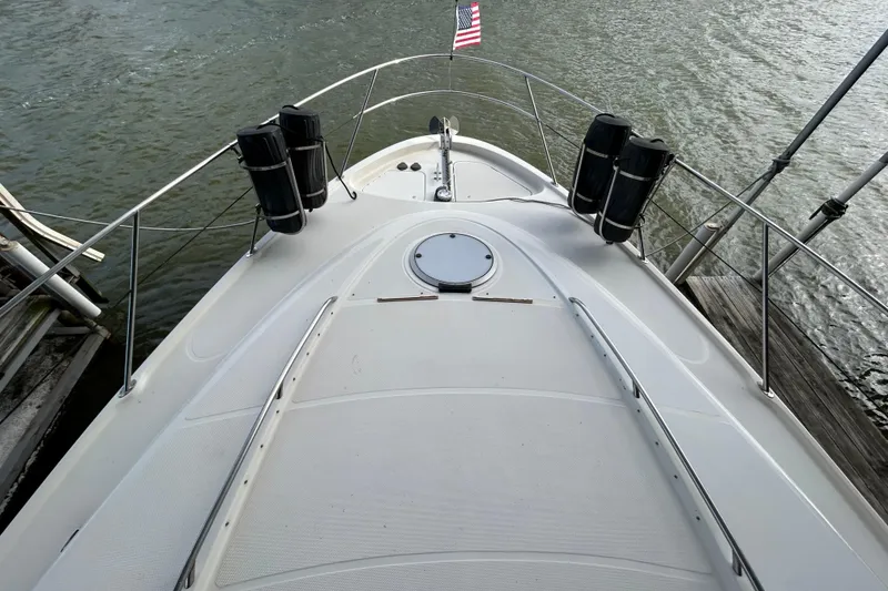 Slide: The Image of 1999 Maxum 4600 SCB yacht with blue LED lights, docked in Highland Village, TX. - 43