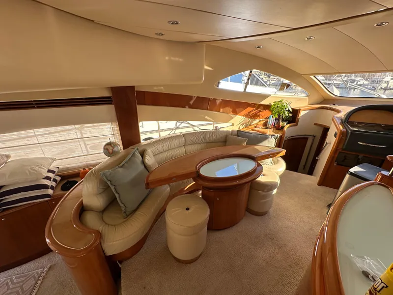 Slide: The Image of Luxurious interior of 2003 Aicon 56 Flybridge yacht with elegant seating and decor. - 26