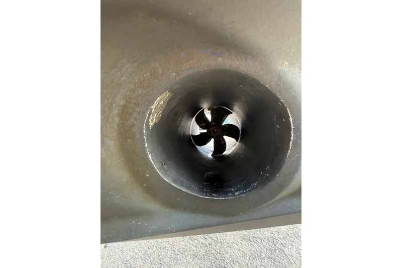 Slide: The Image of Close-up of a 2019 Ranger Tugs R-27 boat propeller inside a tunnel. - 45
