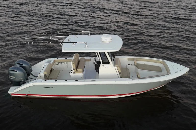Slide: The Image of 2021 Pursuit S 268 Sport boat on water, featuring dual Yamaha engines. - 12