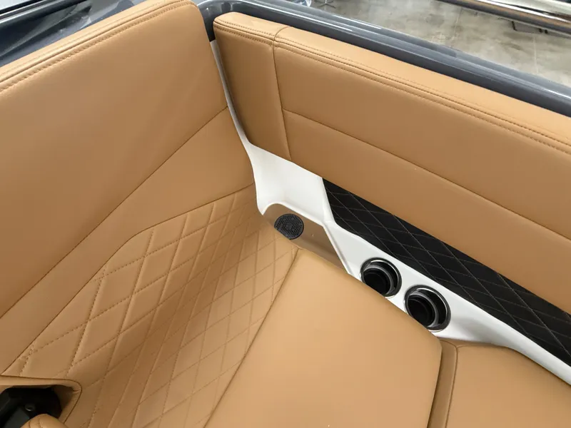 Slide: The Image of 2026 Chaparral GTS 6 interior with tan leather seats. - 13