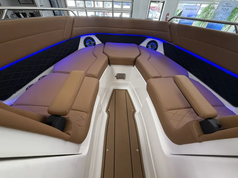 Slide: The Image of Interior of Chaparral GTS 6 boat, 2026 model, featuring blue LED lighting. - 14