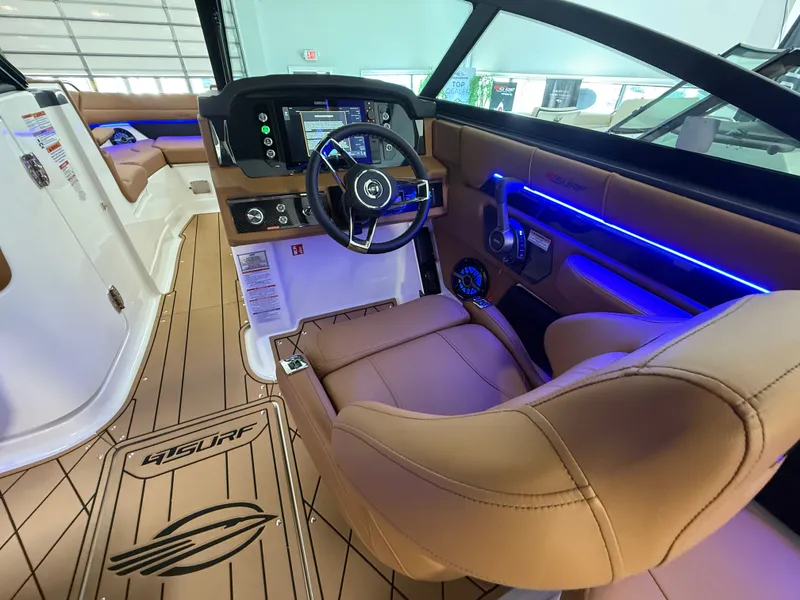 Slide: The Image of Interior of 2026 Chaparral GTS 6 with modern cockpit and blue lighting. - 18