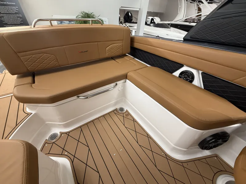 Slide: The Image of Interior of Chaparral GTS 6 boat, 2026 model, featuring brown leather seating. - 6