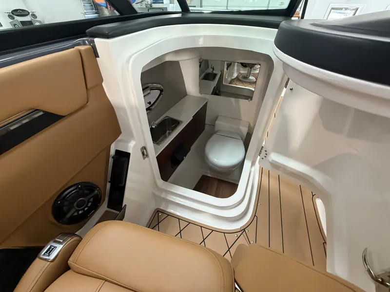 Slide: The Image of Interior of 2026 Chaparral GTS 6 with toilet and sink. - 8